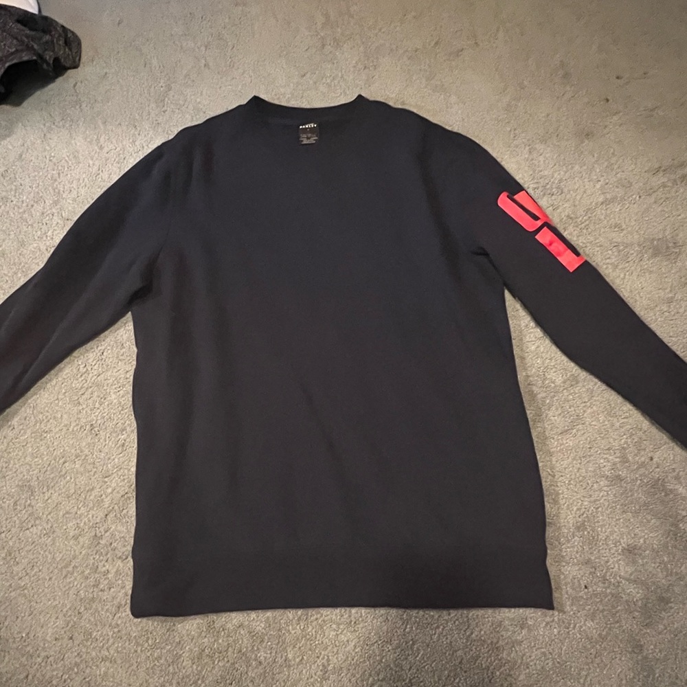 Navy blue Oakley crew neck with red lettering size large